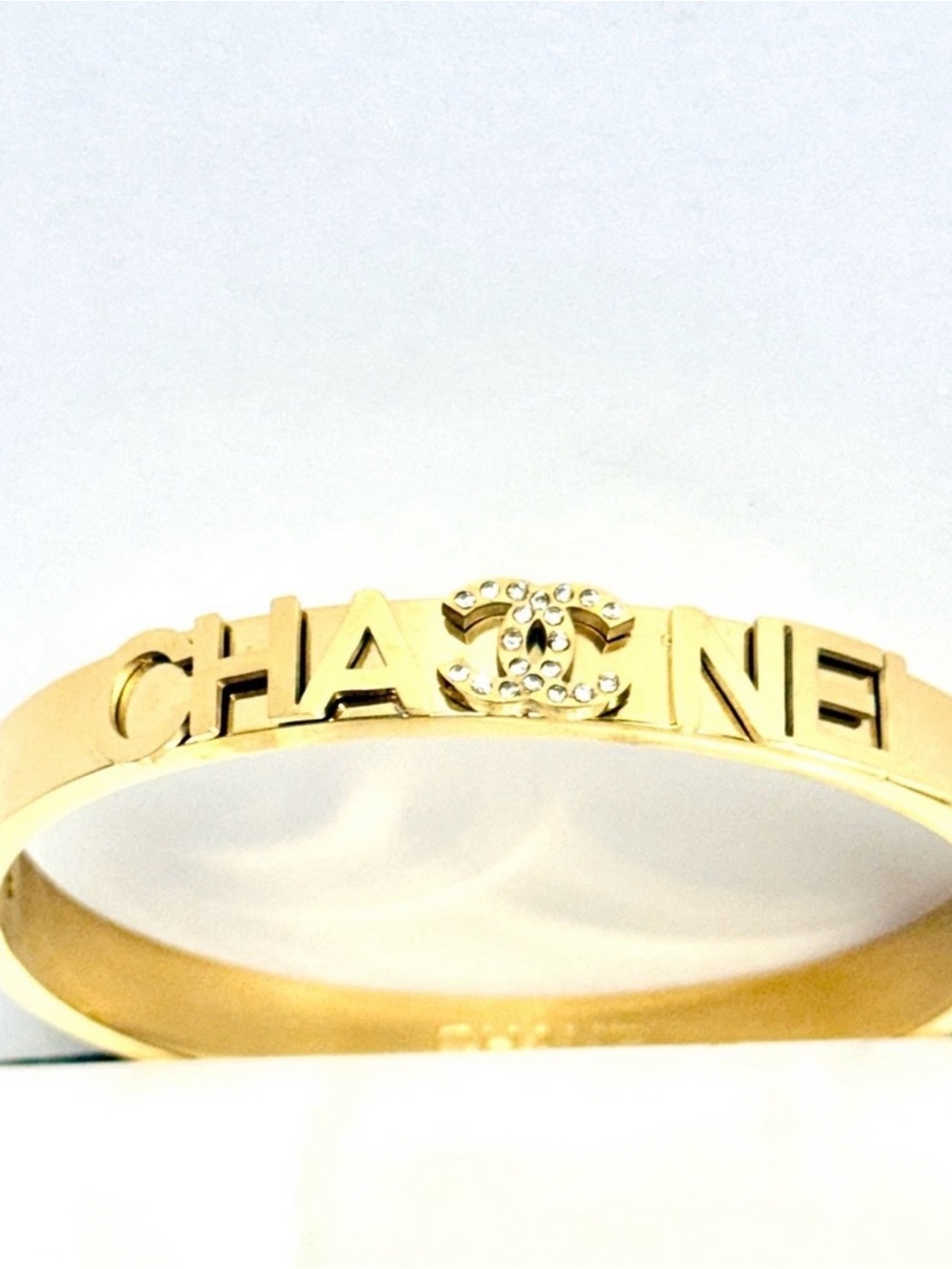 Lulu's Gold Tone Logo Bracelet with Clear Crystals designer inspiration